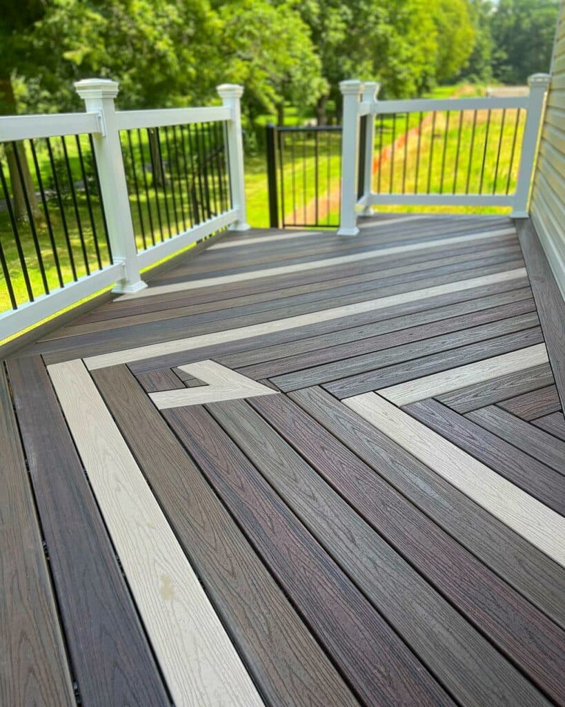 Angled view of a deck corner with a diamond-shaped pattern in the flooring.
