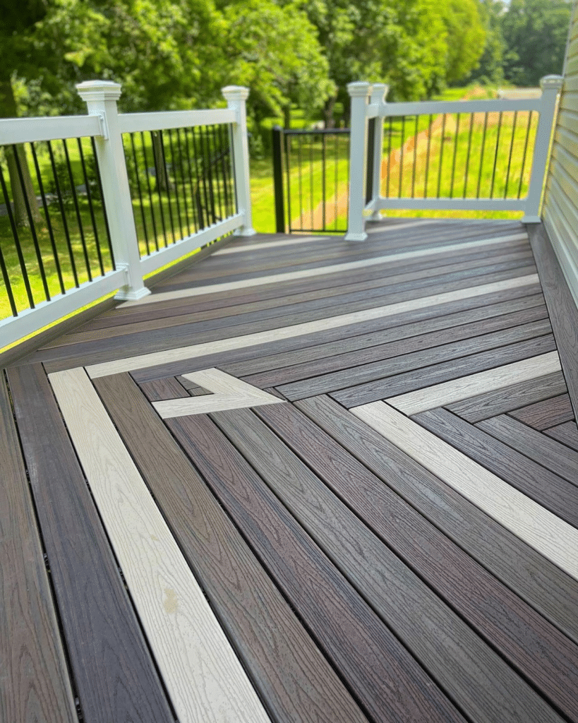Photo of a custom composite deck with multi-colored Trex deck boards arranged in a pattern.