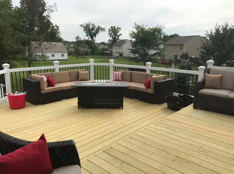 wood deck with outdoor furniture and deck railing - Better Wood Installation in Cold Weather - Build a deck in winter