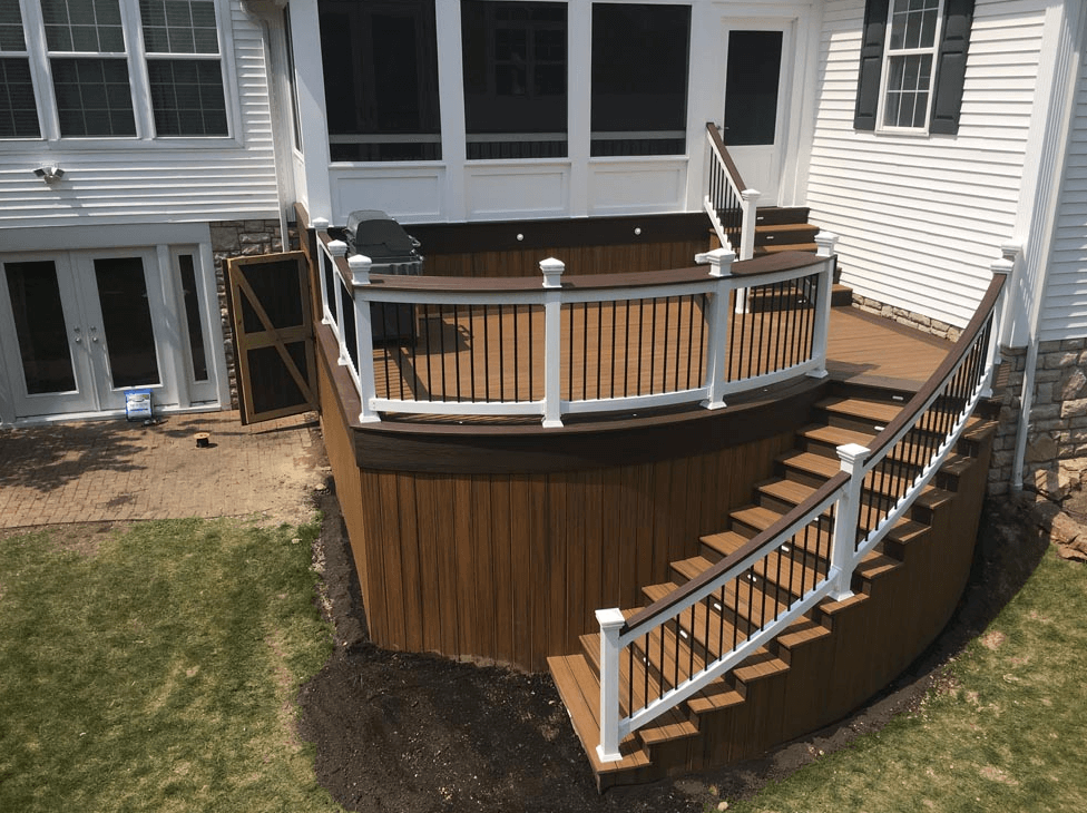 photo of a custom deck with curved deck railing