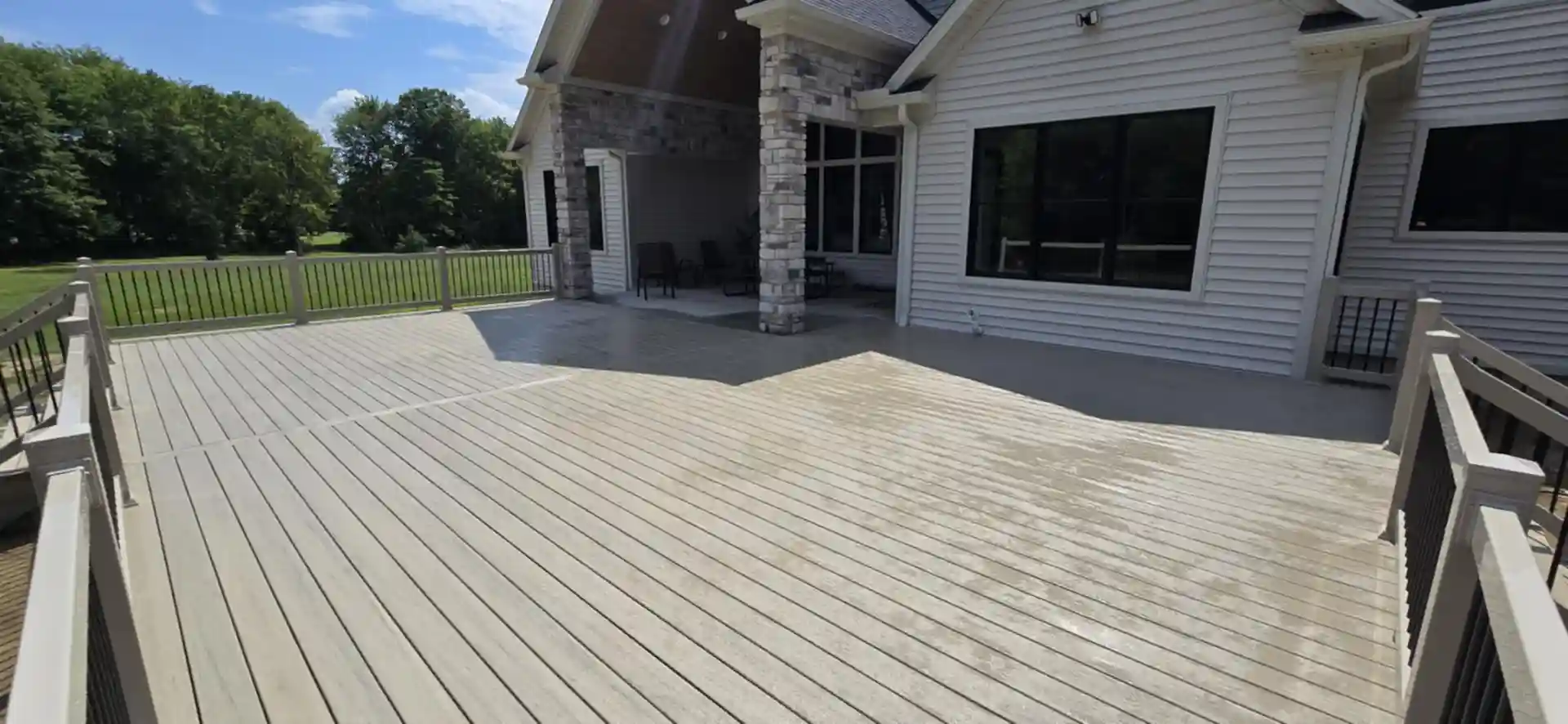 Deck Rebuild vs Deck Repair How Materials Affect Your Decision 2 Photo of a composite deck surface by Hen-House Decks, a deck builder in Northeast Ohio who helps homeowners understand deck rebuild vs deck repair.