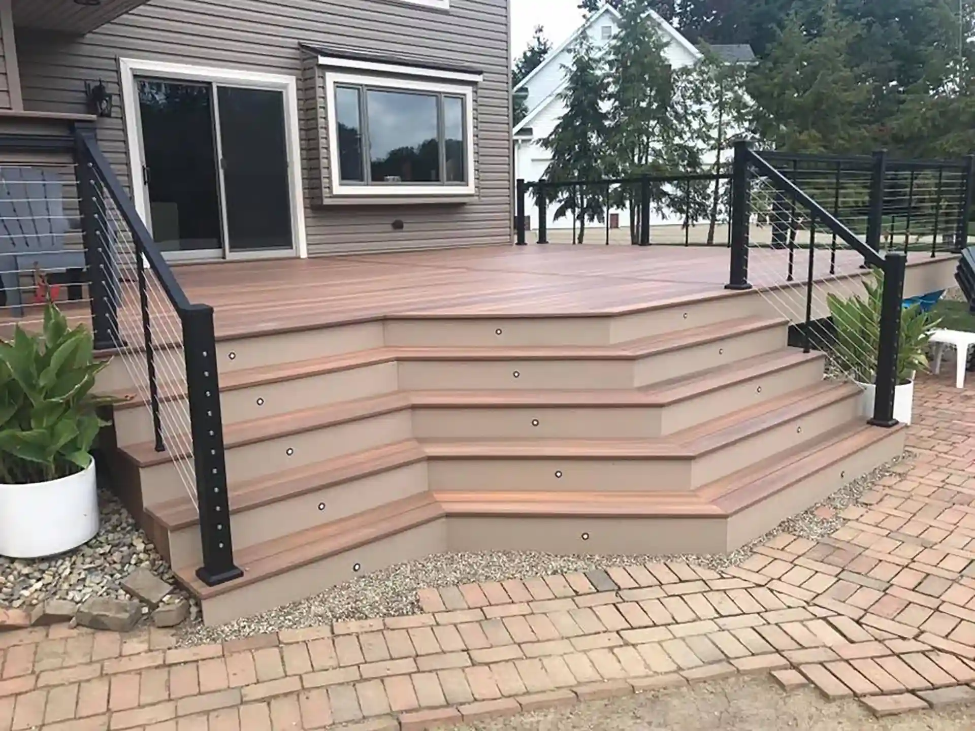 Deck Rebuild vs Deck Repair How Materials Affect Your Decision 3 Photo of a composite deck with cable railing.