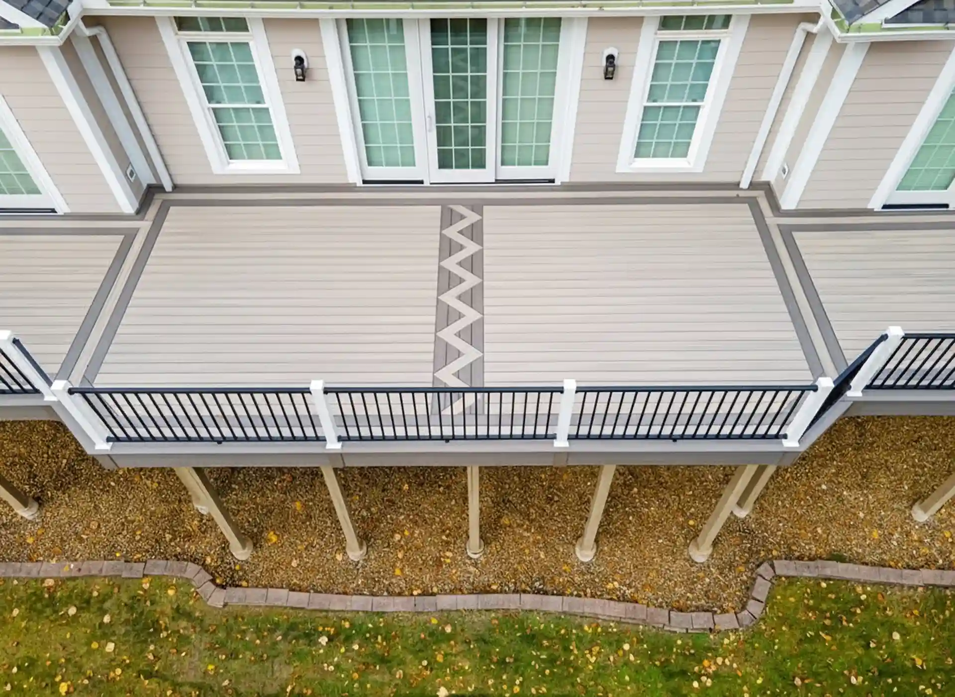 composite deck remodeling in northeast ohio Aerial view of a MoistureShield deck with picture frame borders and custom deck inlay.